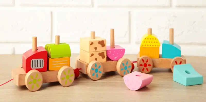 Kids develop a wide range of skills when playing with sorting shapes.